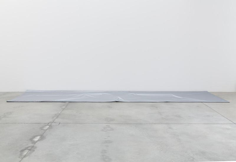 Jason Dodge, Silver tarp that cover a part of the floor., 2014