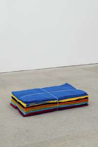 Jason Dodge, In Hong Kong, several weavings, the combined length of the yarn that was woven, equals the distance from the earth 